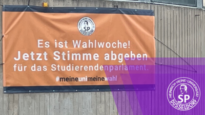 Zu sehen isrt ein Banner, der auf die Wahl aufmerksam macht