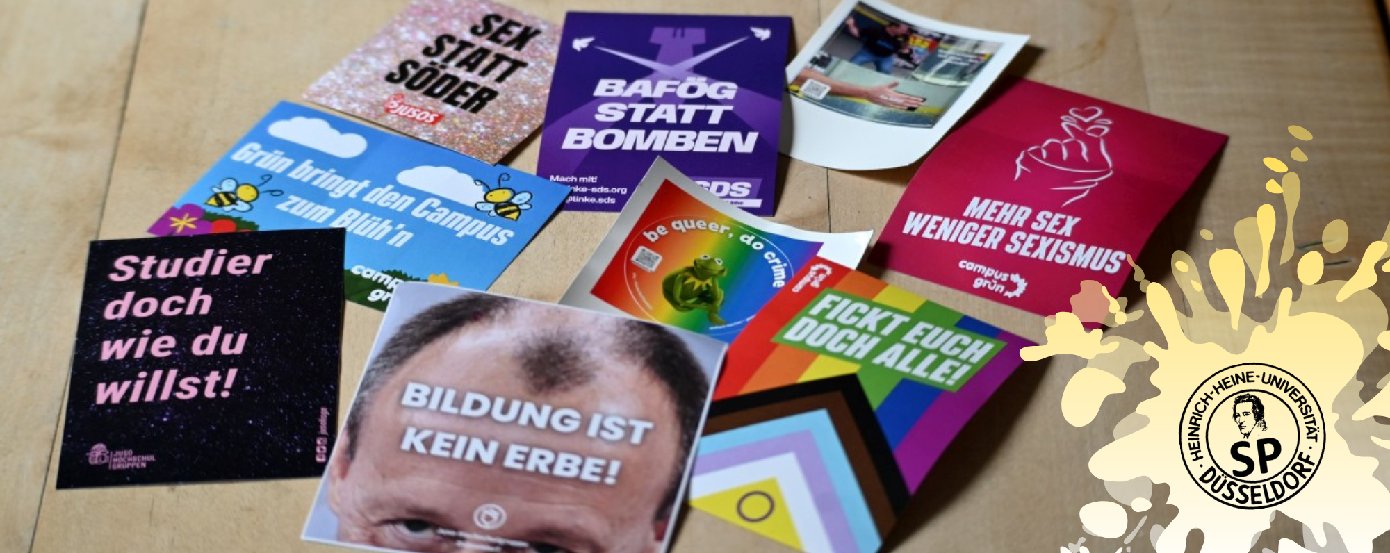Auf dem Bild sieht man die verschiedenen Sticker der Listen die dieses Jahr bei der SP-Wahl der Heine-Uni antreten (Foto: Andreas Meske)