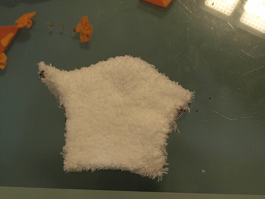 Eine ausgeschnittene Sockenform.