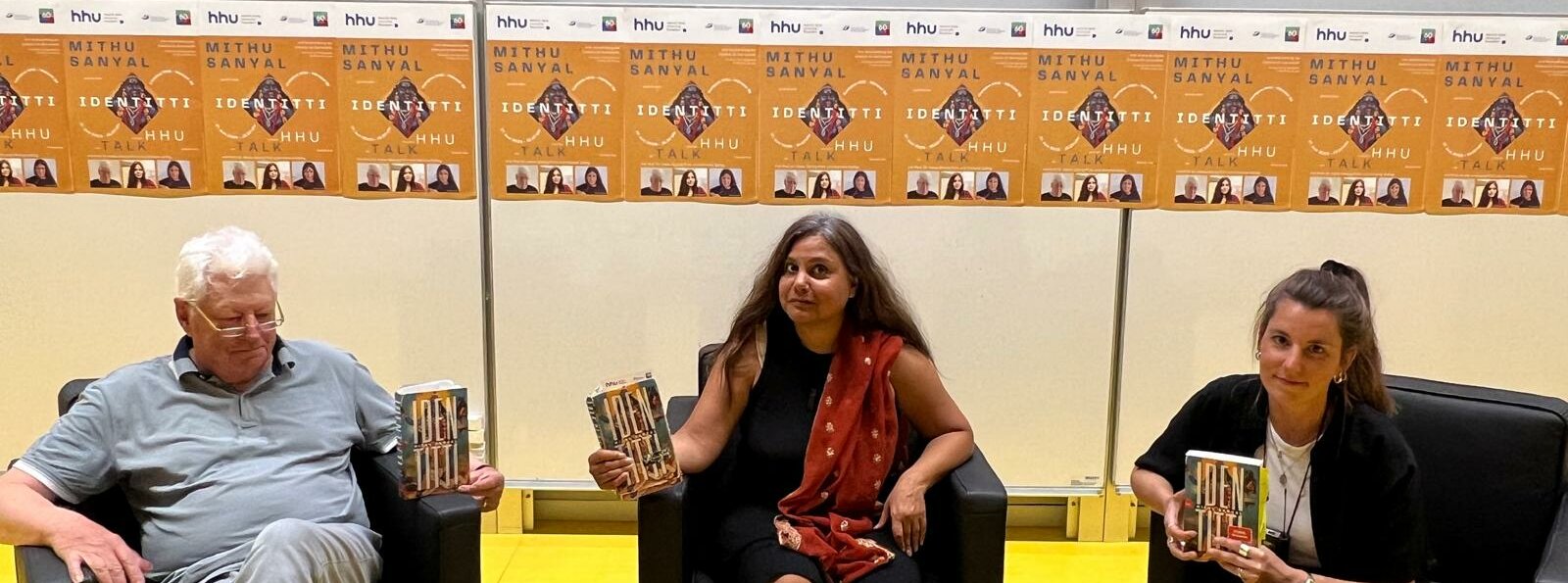 Auf dem Foto sind Prof. Dr. Hans Georg Pott, Autorin Mithu Sanyal und Moderatorin Simone Saftig zu sehen.